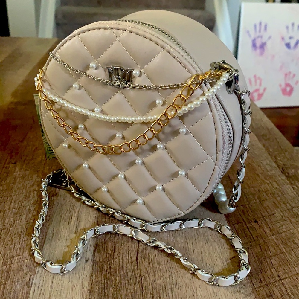 Small cream color bag
